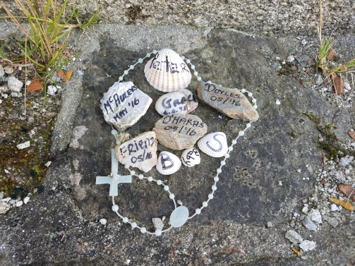 Shells left on church wall by previous pilgrims